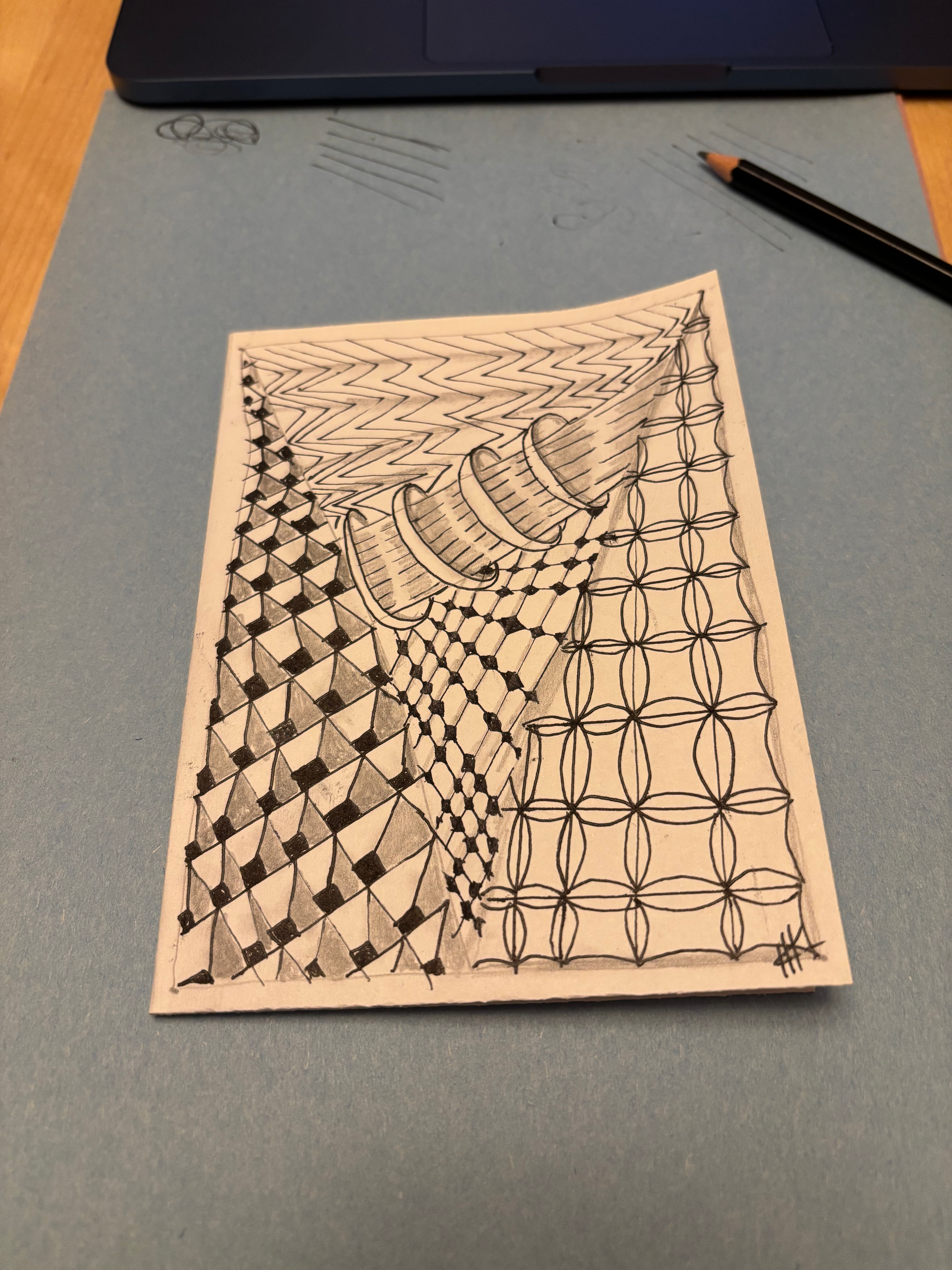 A Zendoodle I made earlier this week, a pin an ink drawing featuring several gemometric shapes